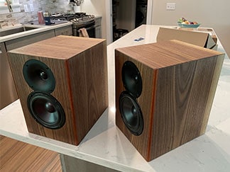 Cover image for Walnut C-Note project. C-Note speaker pair with a walnut wood grain-styled finish.