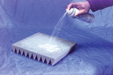 Image of step 1, adhesive applied to the back of a foam section.