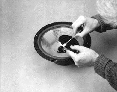 Reattaching the dust cap.
